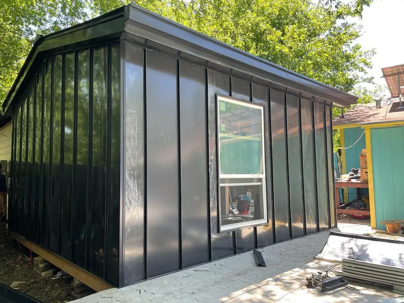 Black standing seam metal wall panels for Roof Inspection in Elyria