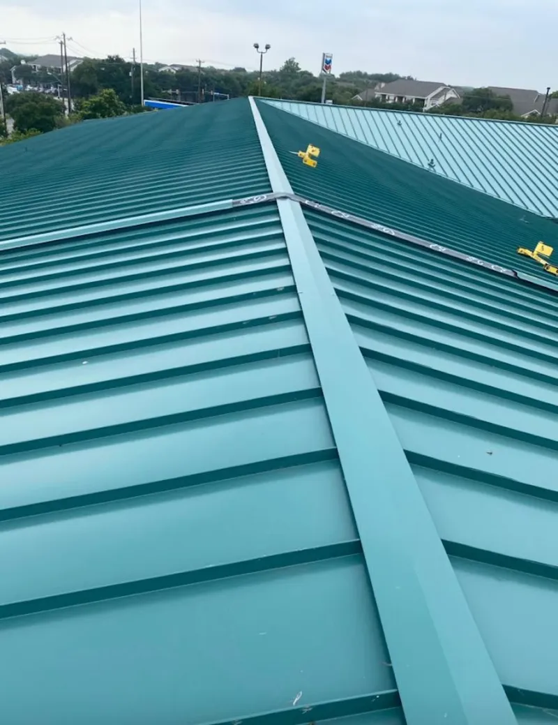 Green commercial metal roof ridge and valley for Metal Roof Repair in Elyria