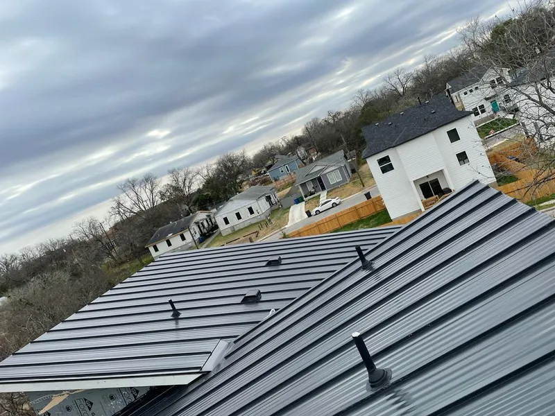 Standing seam metal roof panels with vents for Skylight Repair in Elyria